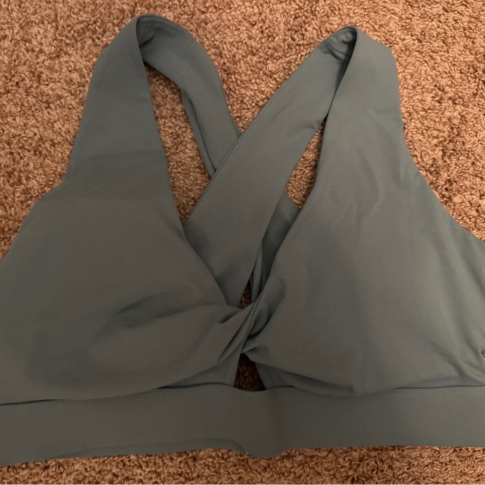 Fabletics Oasis Twist Medium Impact Sports Bra in Arctic Wave